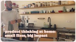 Man in modern kitchen drying dishes; text overlay reads “product thinking at home: small fixes, big impact”