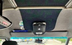 inside of the van showing an apple sticker
